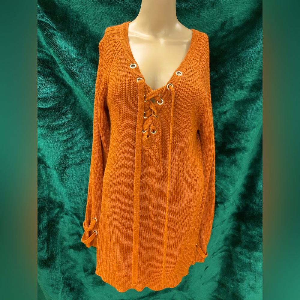 Burnt orange colored pullover sweater